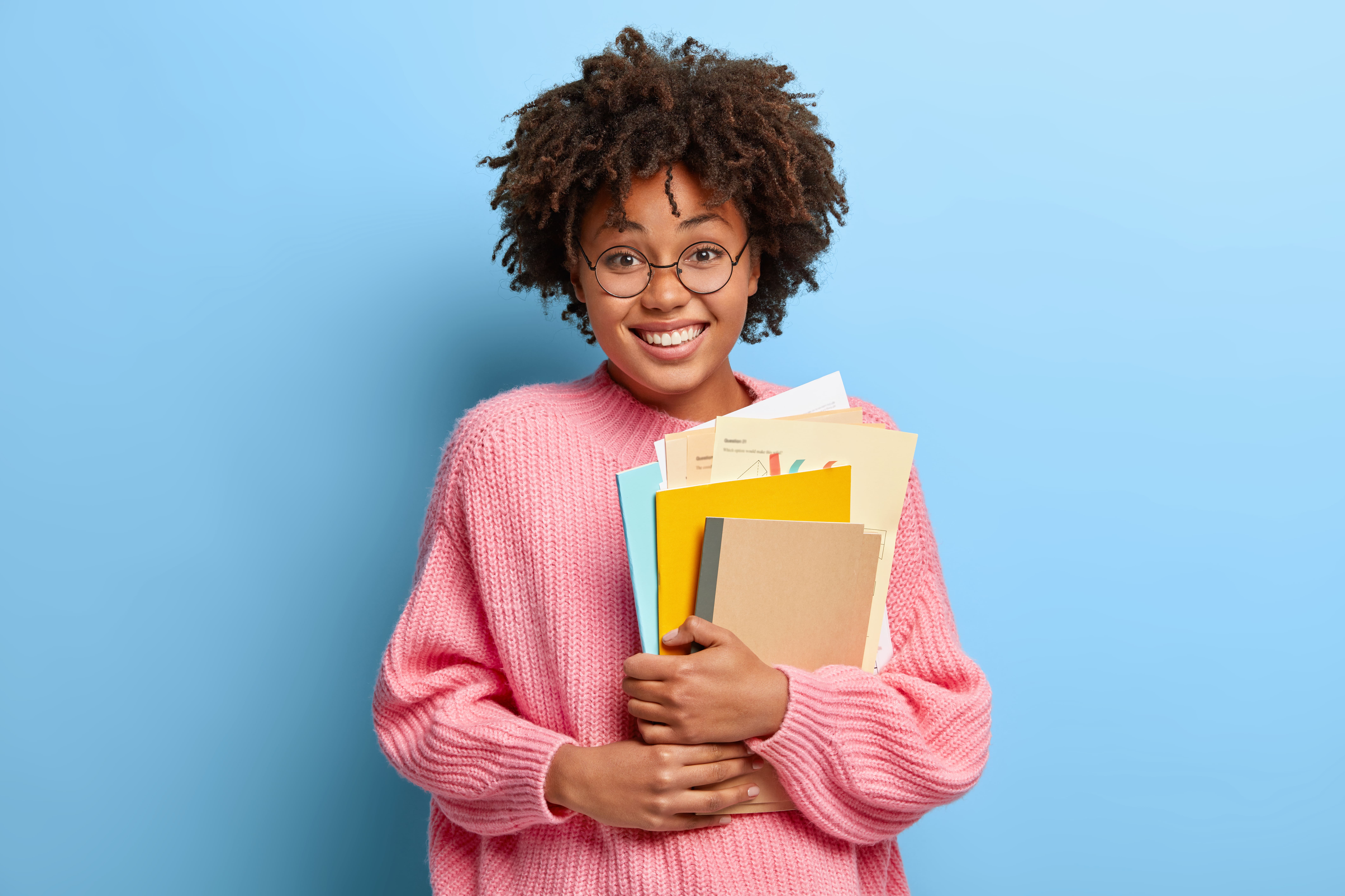 Student holding books